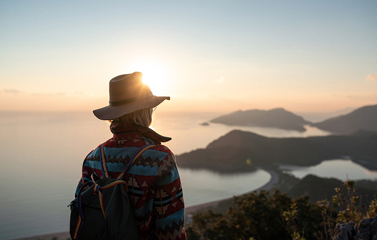 woman staring out at the mountains