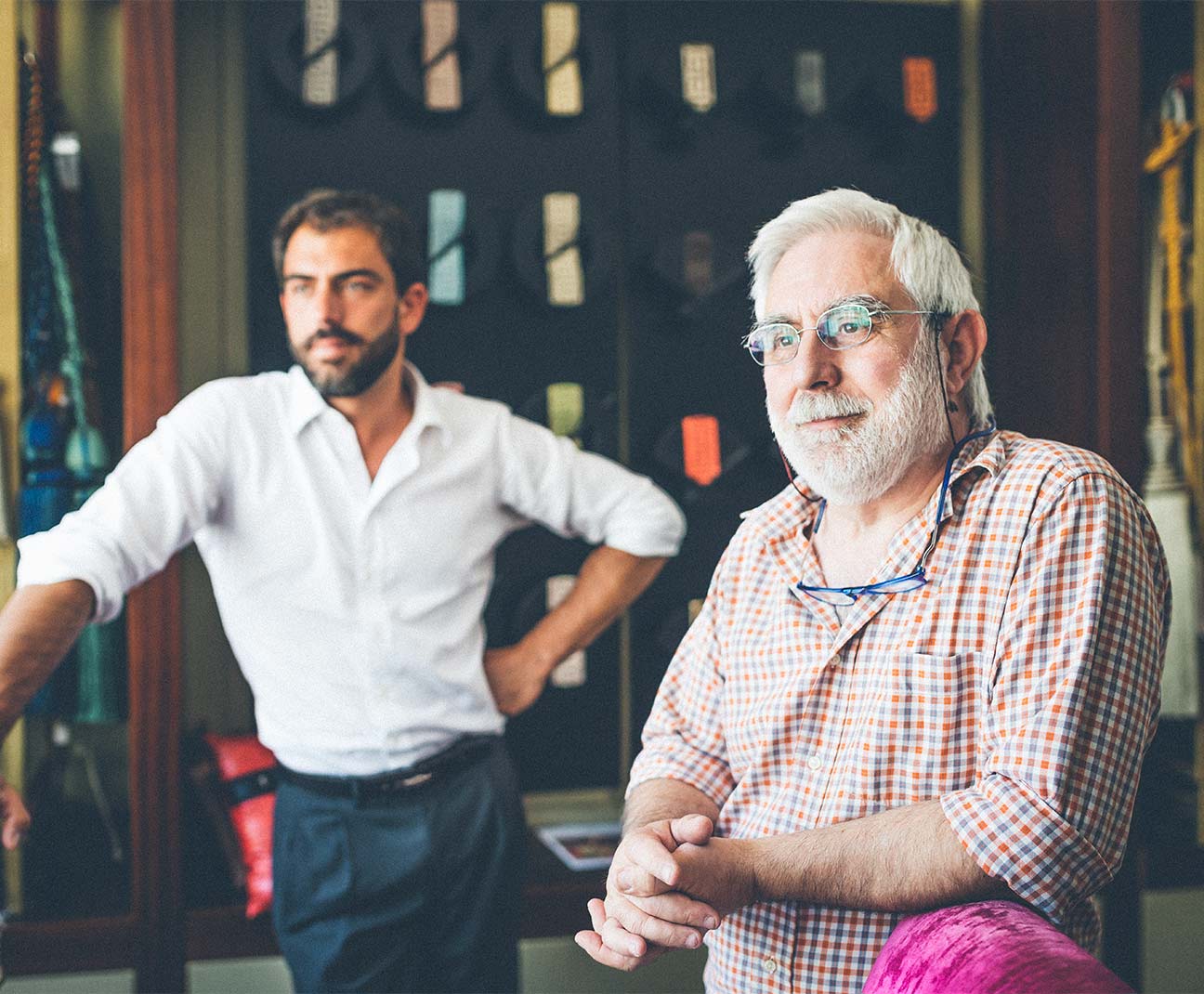 Father and son in upholstery shop