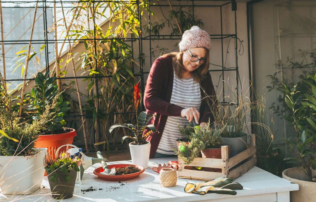 woman gardening on her terrace