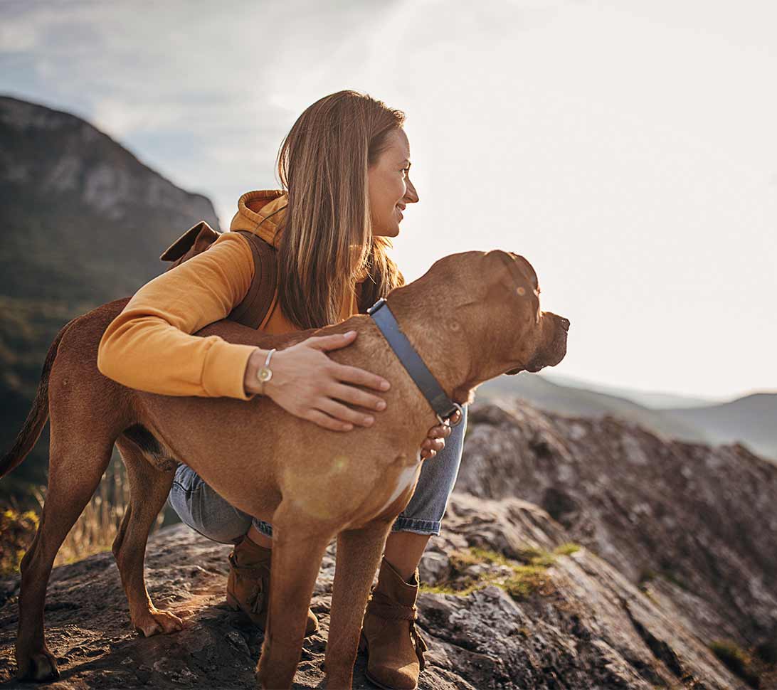woman with dog hiking