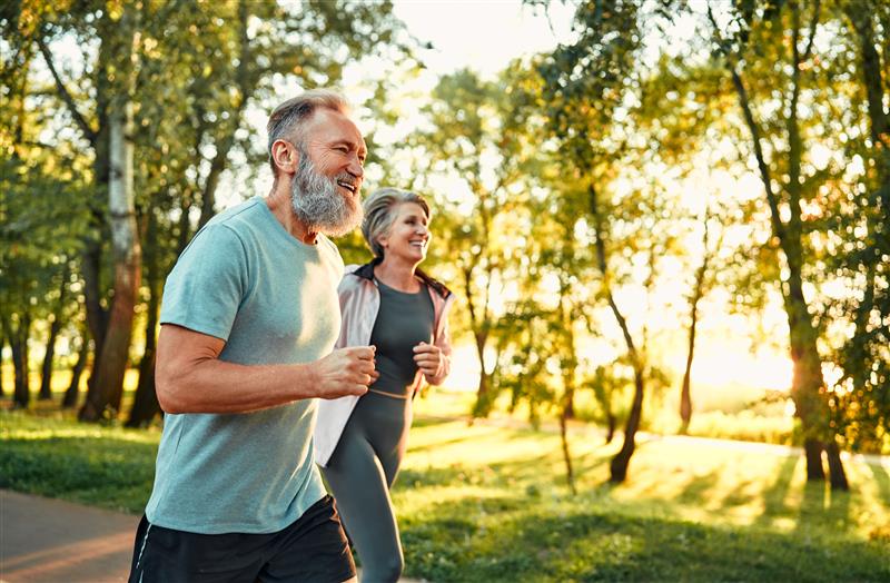 Middle aged couple jogging
