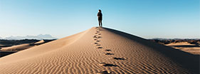 Someone standing on the sand dunes