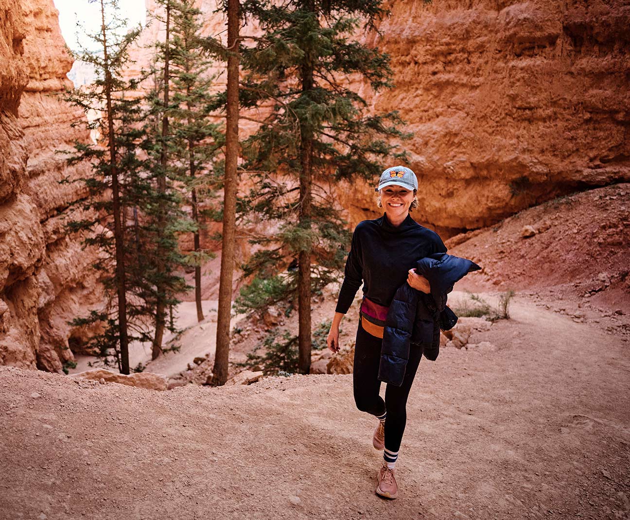 Young woman hiking up Bryce Canyon
