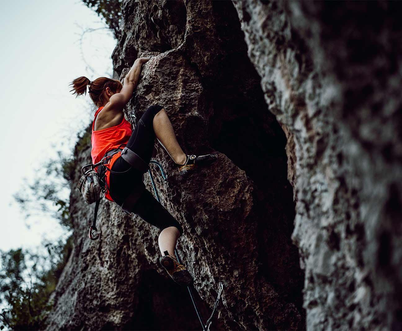 woman rock climbing