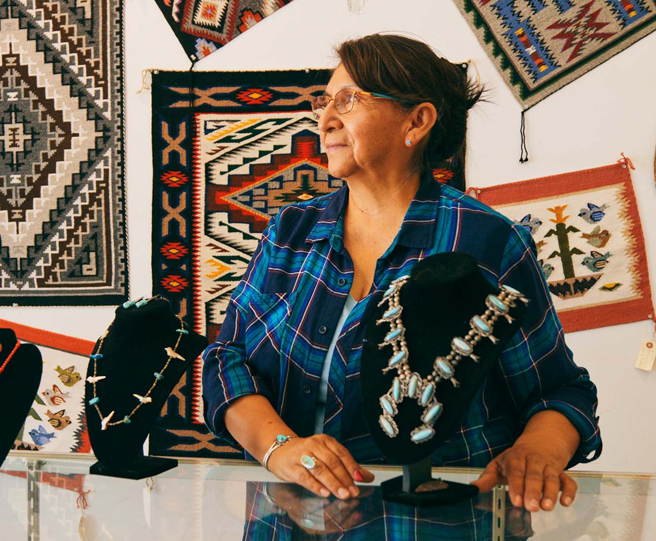Native American woman in her jewelry store