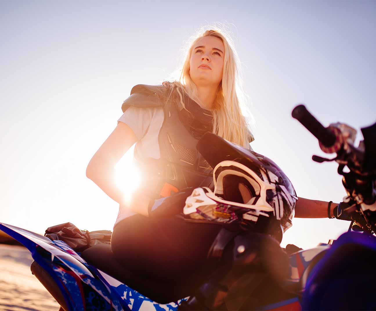 Woman sitting on atv