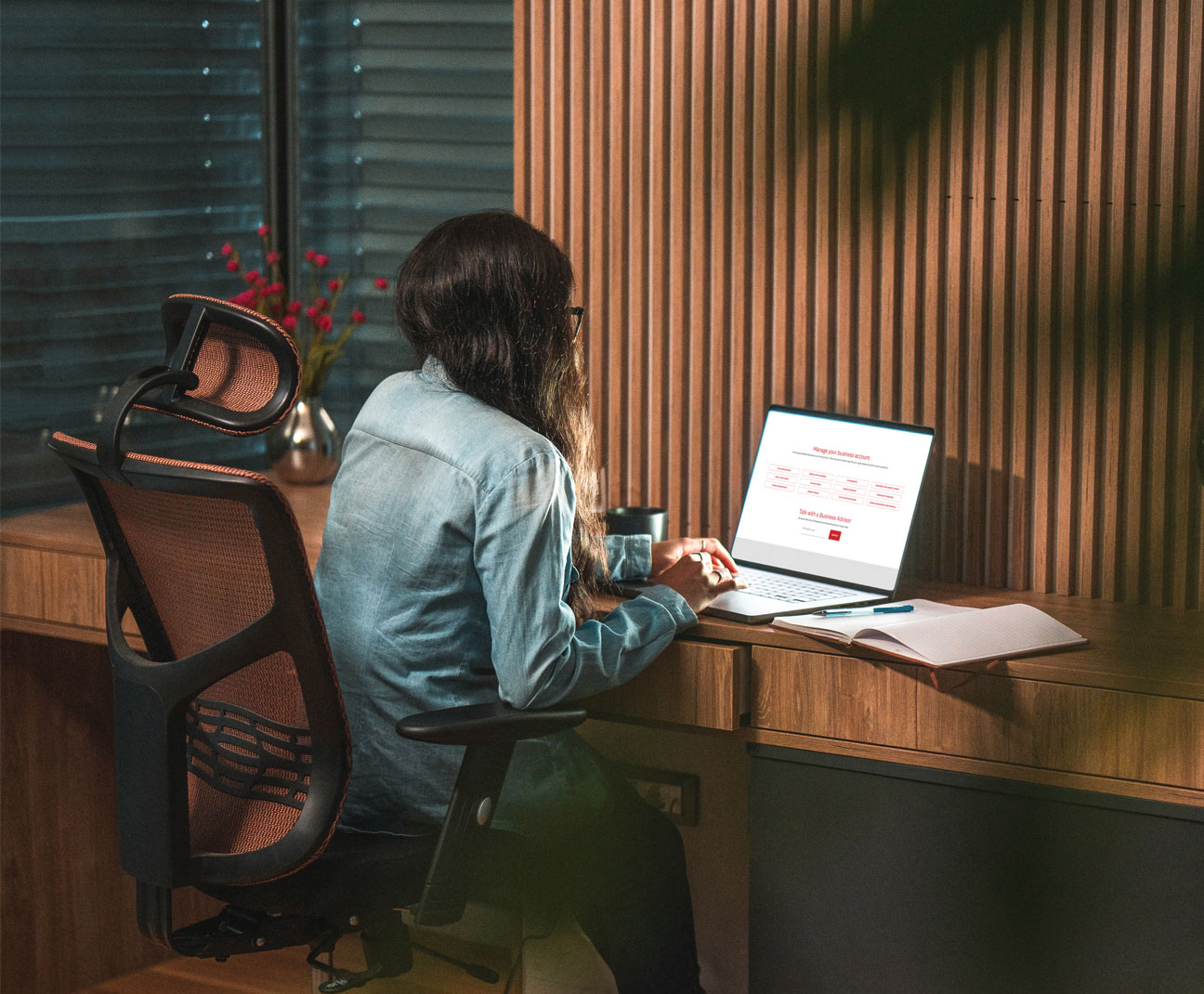 woman working on a laptop computer