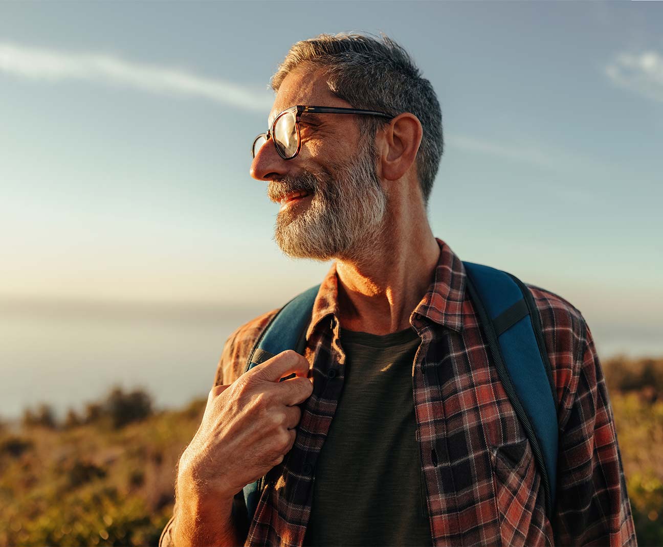 man hiking with backpack