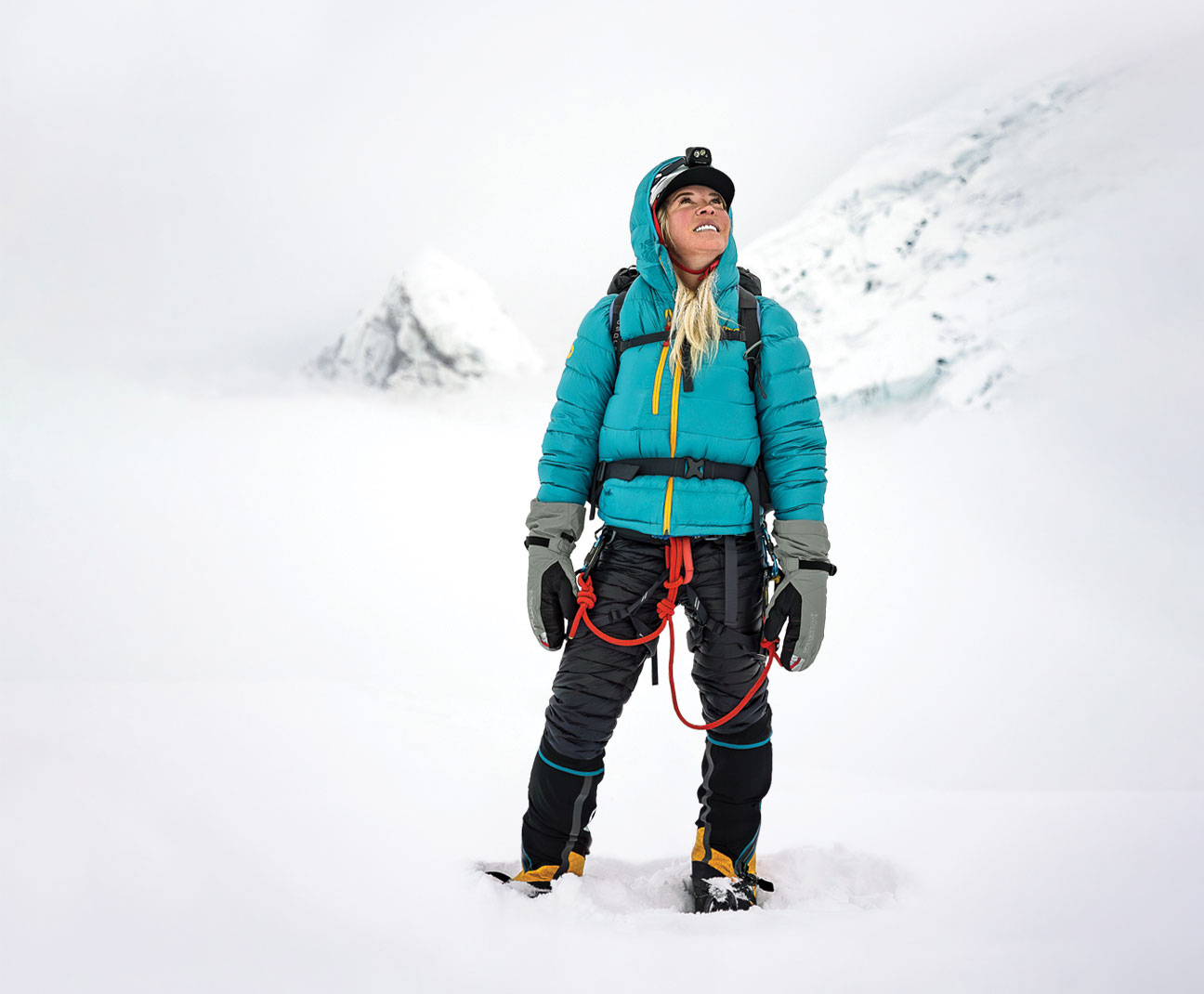 Jenn Drummond standing on a snowy mountain