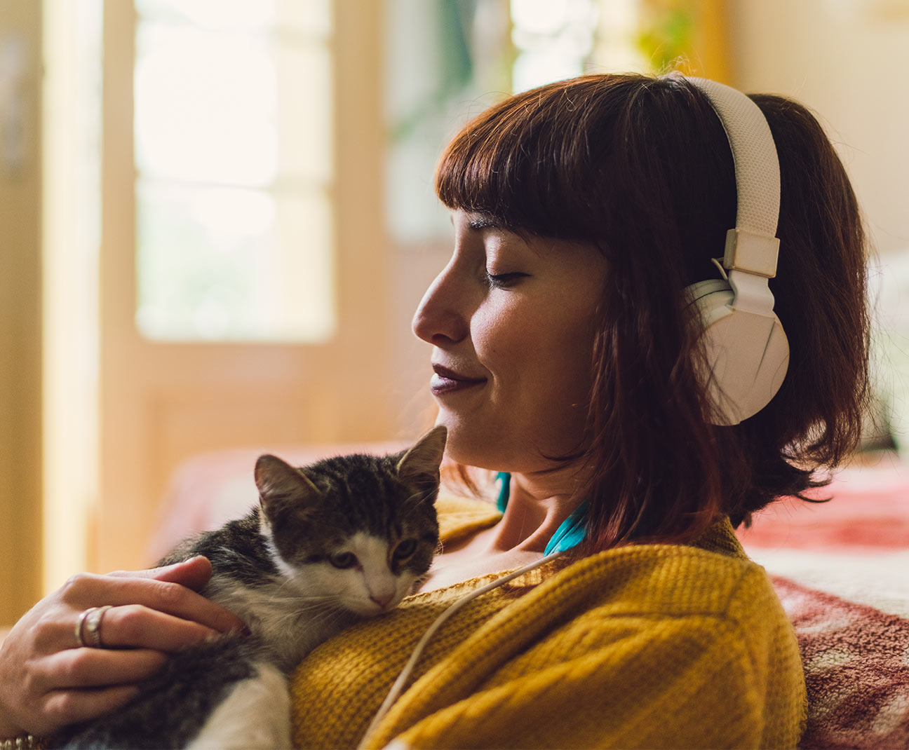 Woman holding her cat