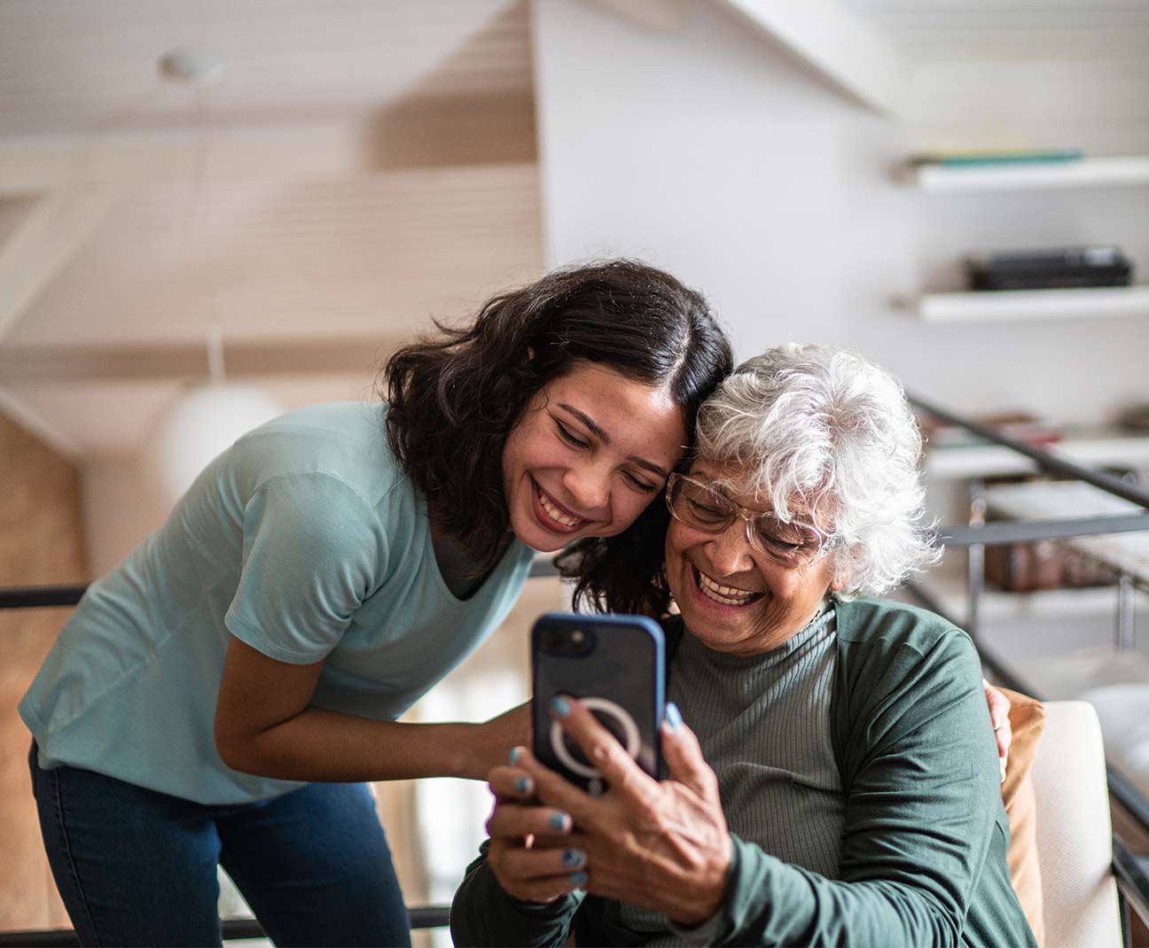 Grandmother and daughter on phone