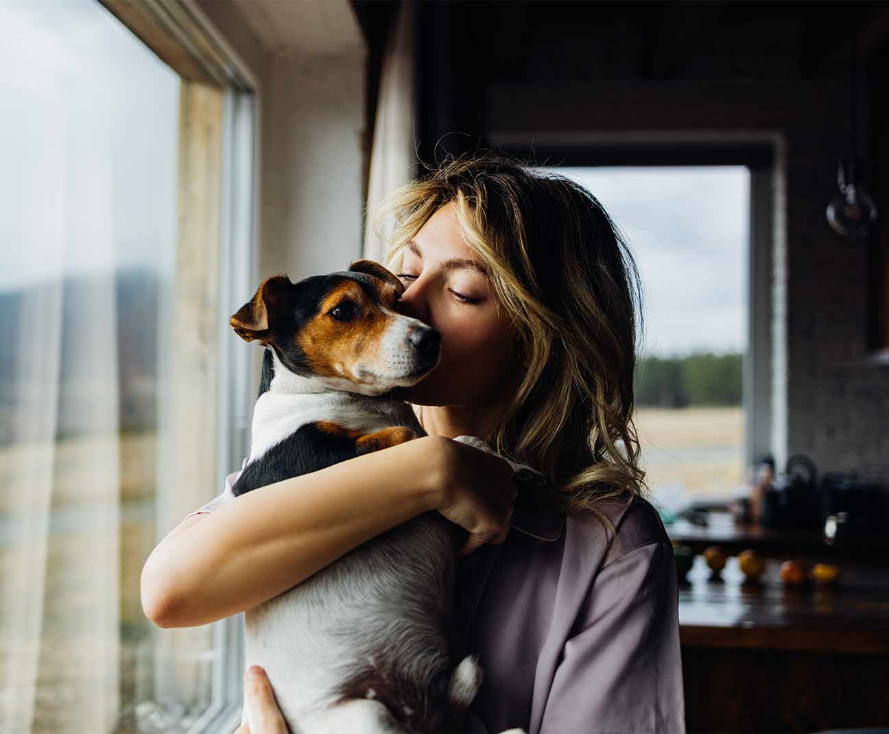 Woman holding a dog
