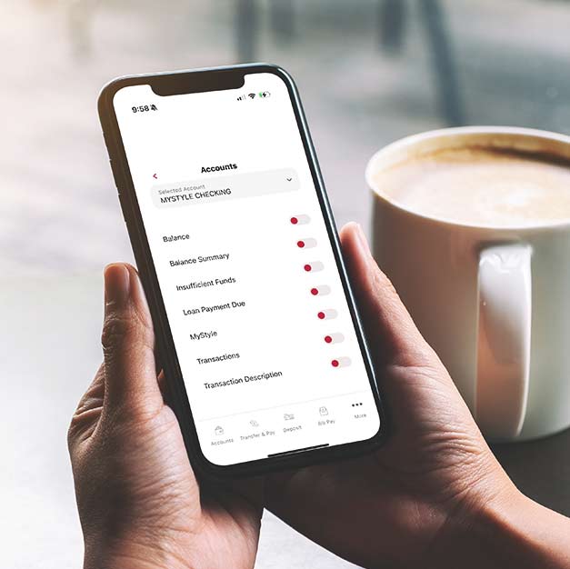 Person viewing macu mobile app