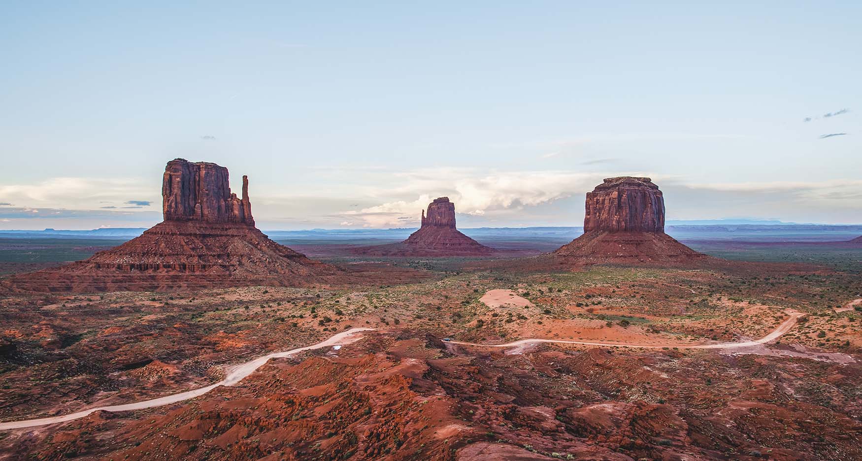 road running through red rock scenery