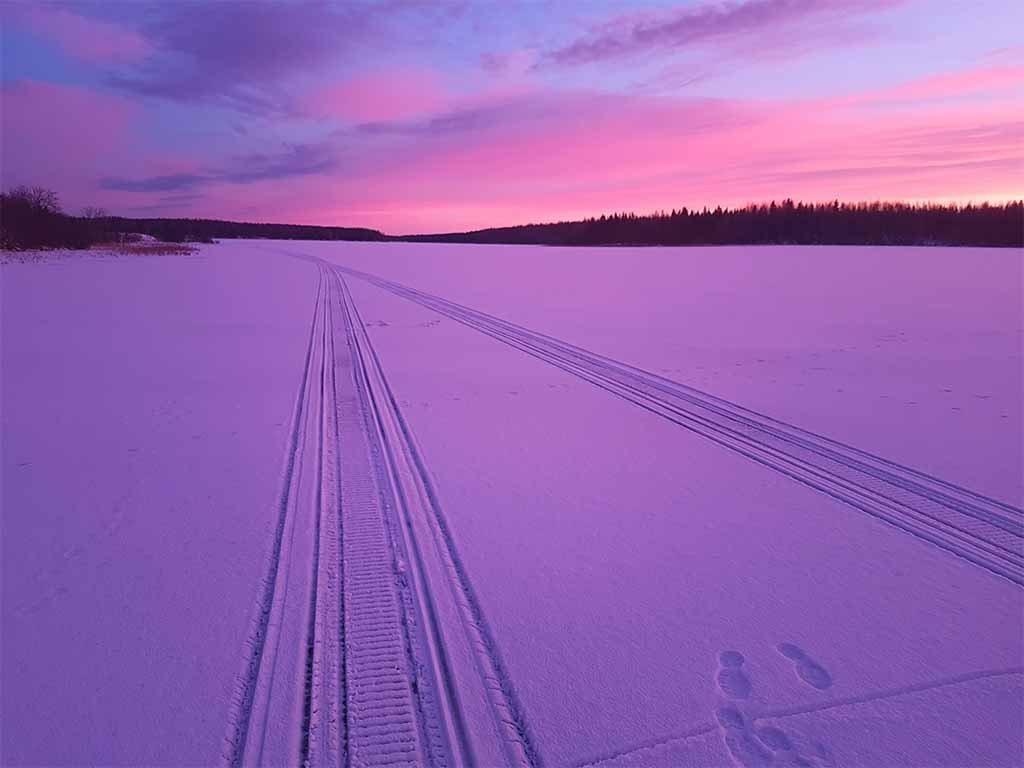 snowy lake bed at dusk