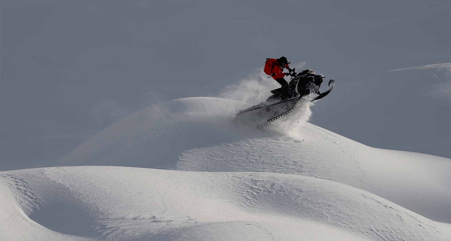 snowmobiler catching air