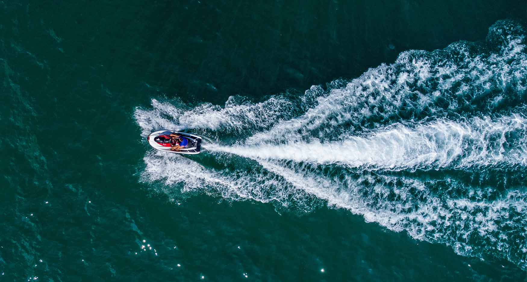aerial view of personal watercraft in a lake