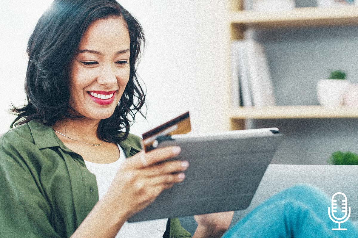 woman making an online purchase on her tablet