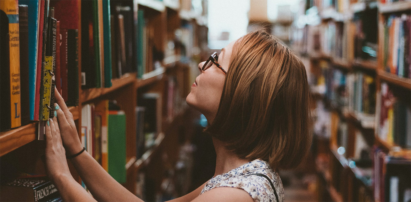 woman browsing in library