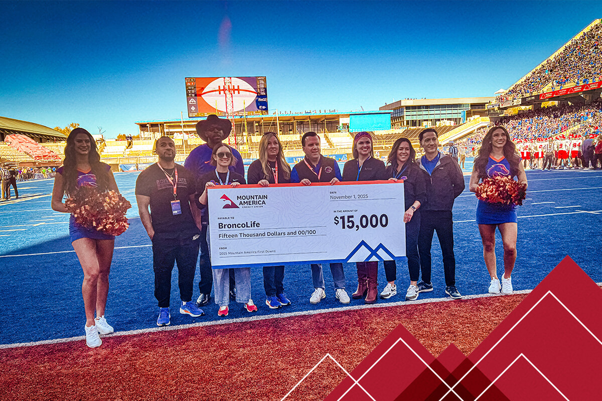 Mountain America team presenting a check to BroncoLife