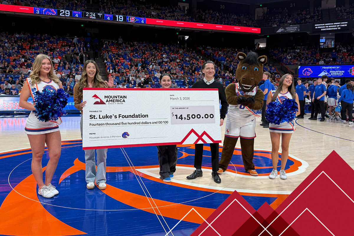 Mountain America employees presenting a check donation to St. Luke's Foundation