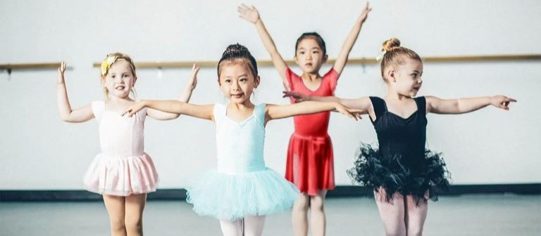 four ballerina girls in different colors