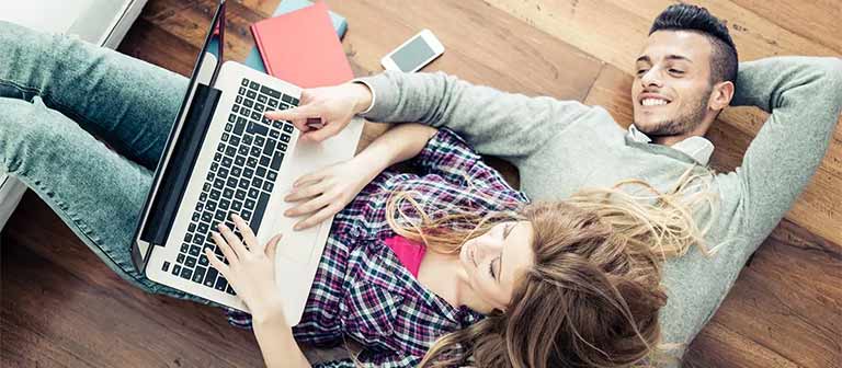 couple using a laptop