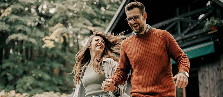 couple hiking in woods