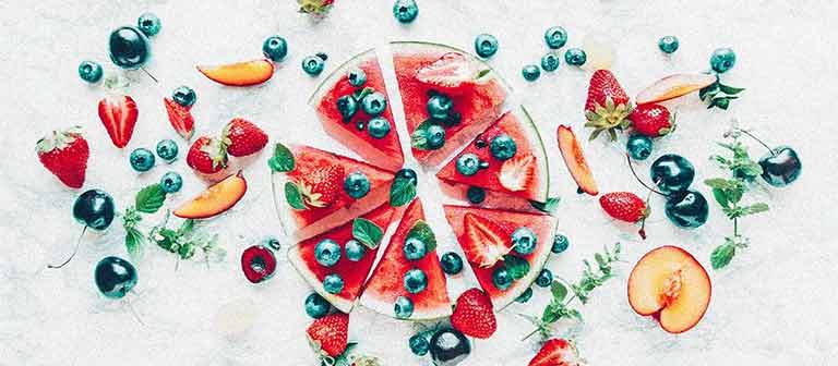 overhead view of a watermelon sliced into sections