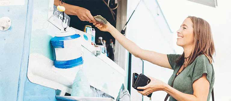 Woman paying for food