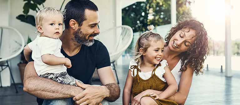 Happy family on a porch