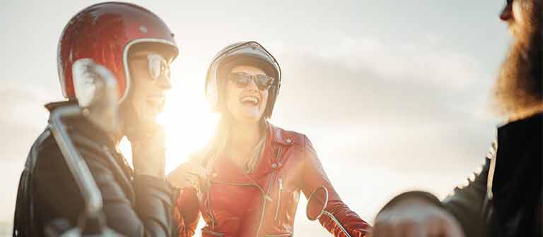 Women in motorcycle helmets