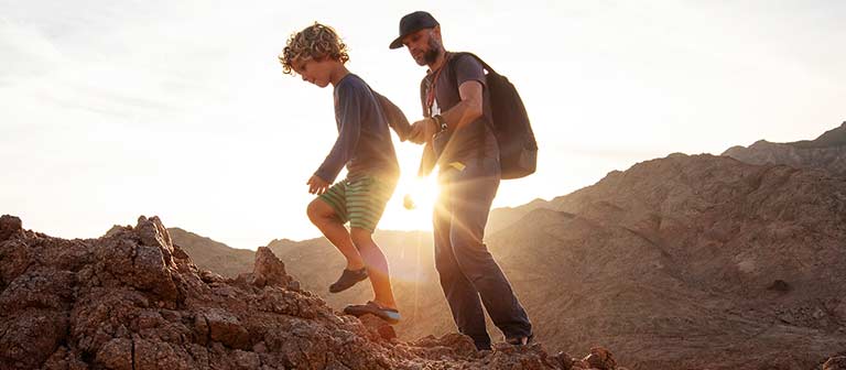 father and son hiking