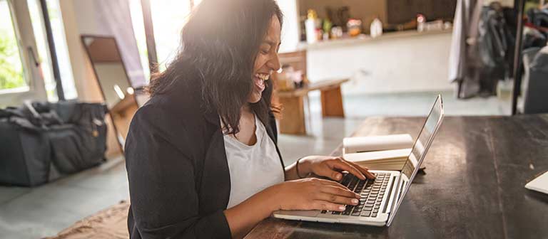 Woman typing on computer