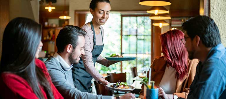 Group of workers eating at a restaurant