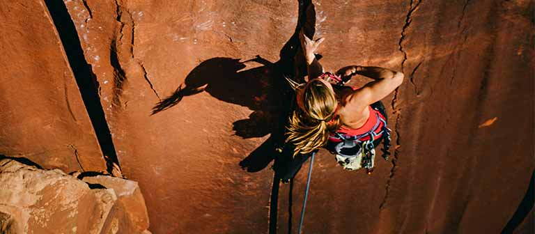 Woman rock climbing