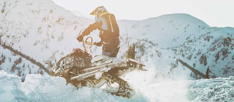 Man riding snowmobile