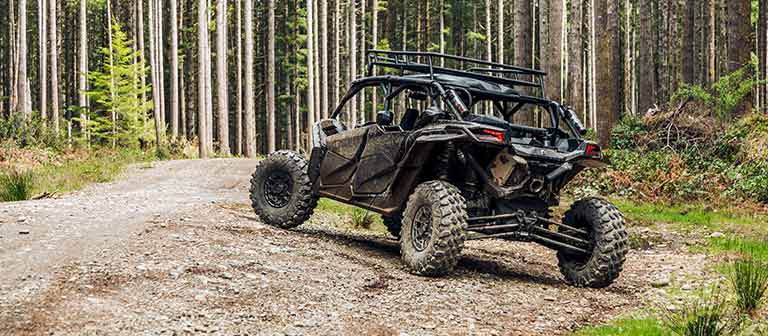 side-by-side vehicle on dirt road