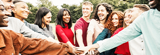 Group of happy people huddling