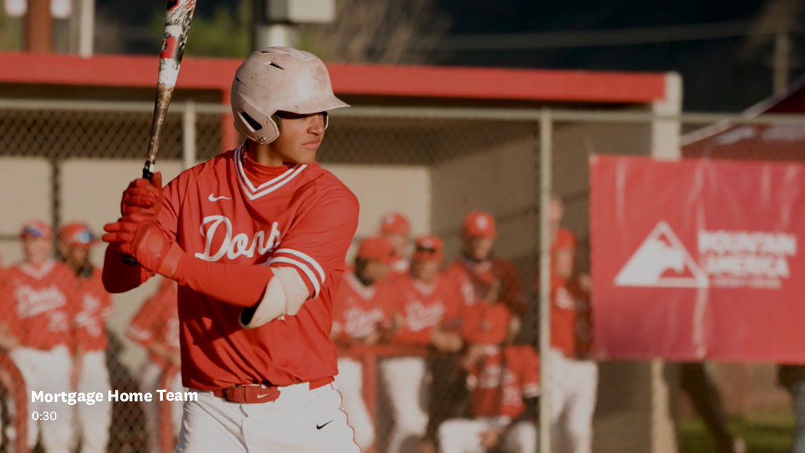 Teen swinging a baseball bat