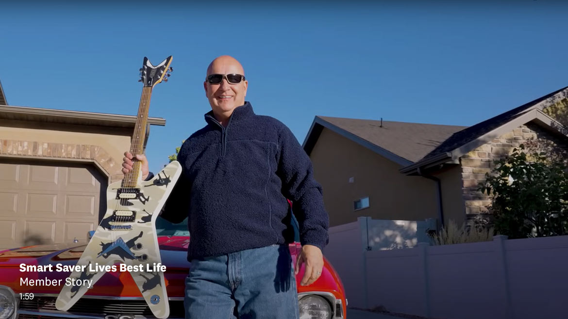 man holding guitar